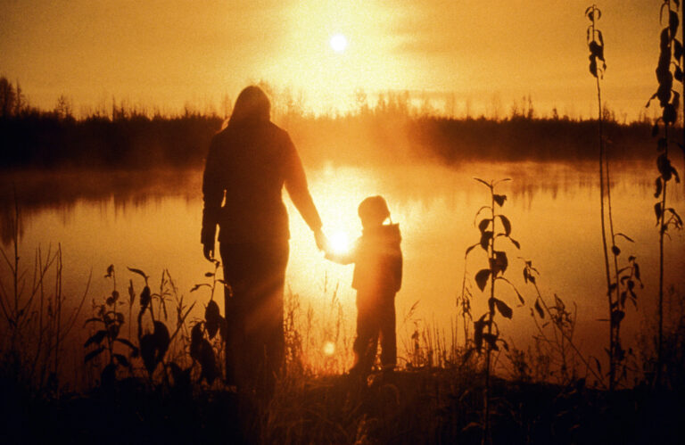 Mother and son walking