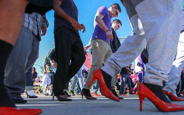 Men putting hisself in woman's shoe